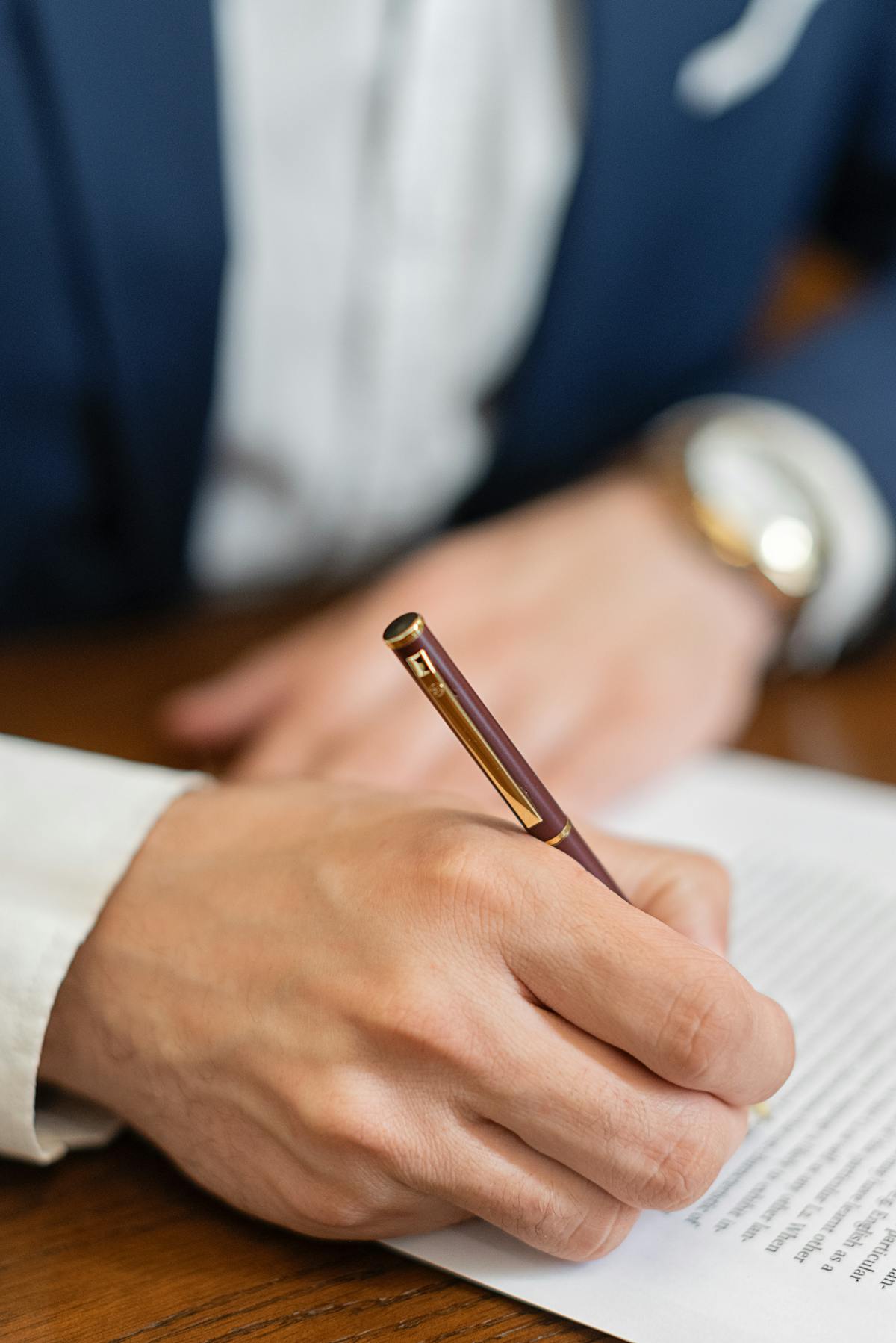 Hand signing a real estate loan contract